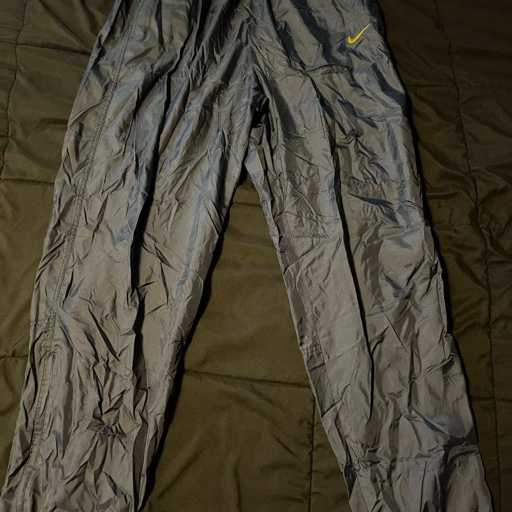 Nike joggers navy blue two pockets with dark yellow swoosh